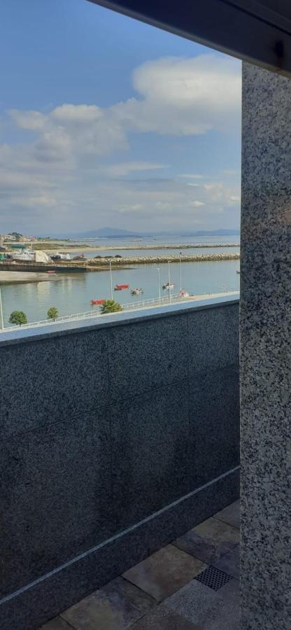 Apartamentos Puerto De Aguino Couso Bagian luar foto